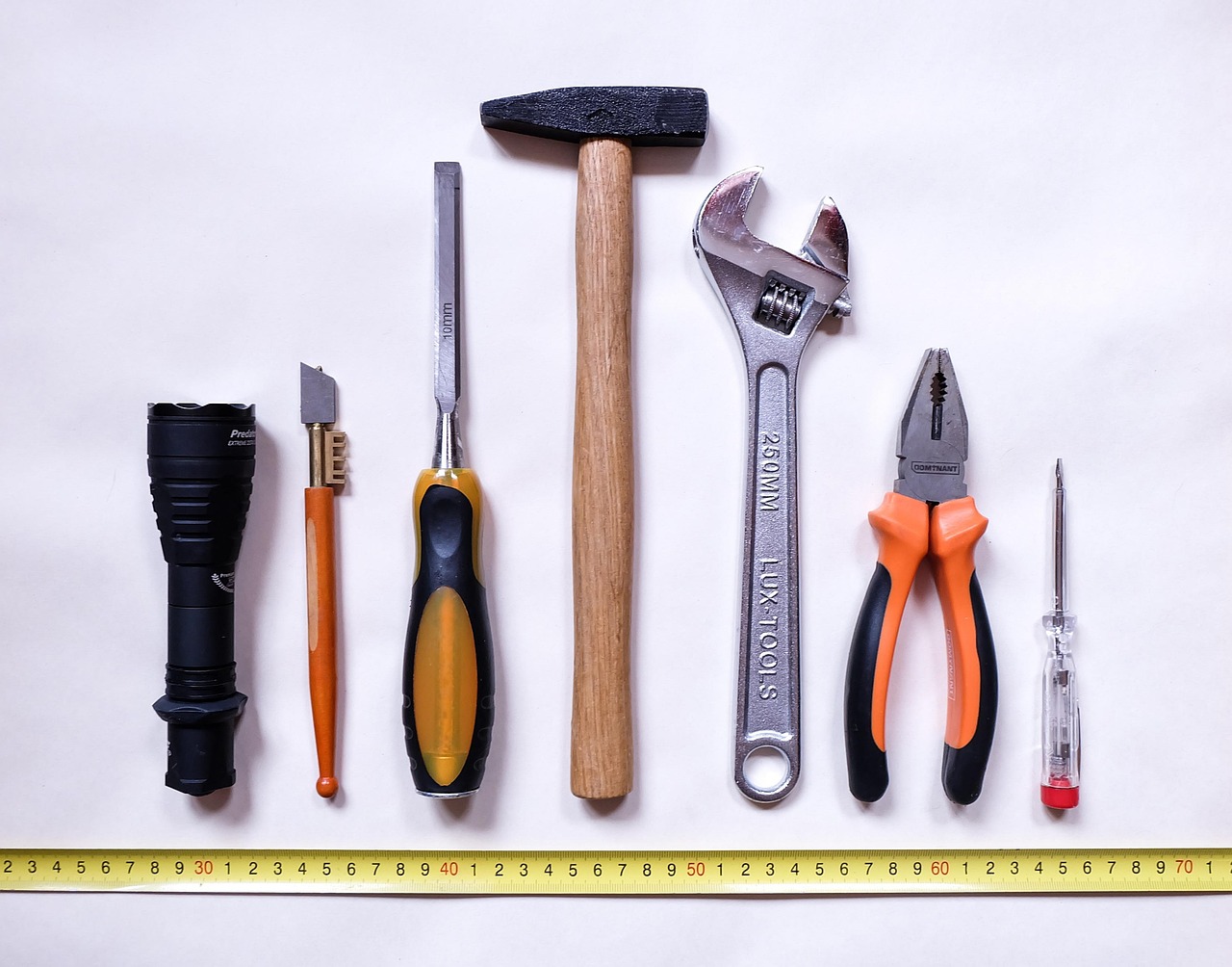 Repair toolkit with wrenches, screwdriver and flashlight